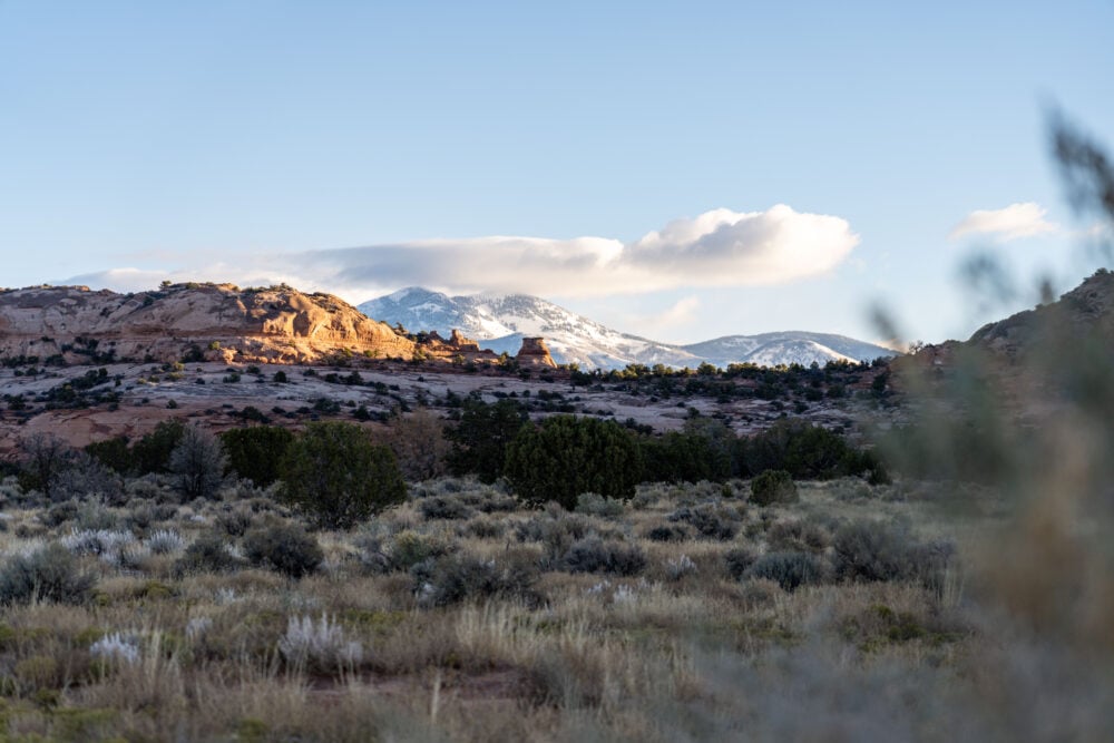 View of ULUM Moab's property overlooking the La Sal Mountains and Looking Glass Rock.