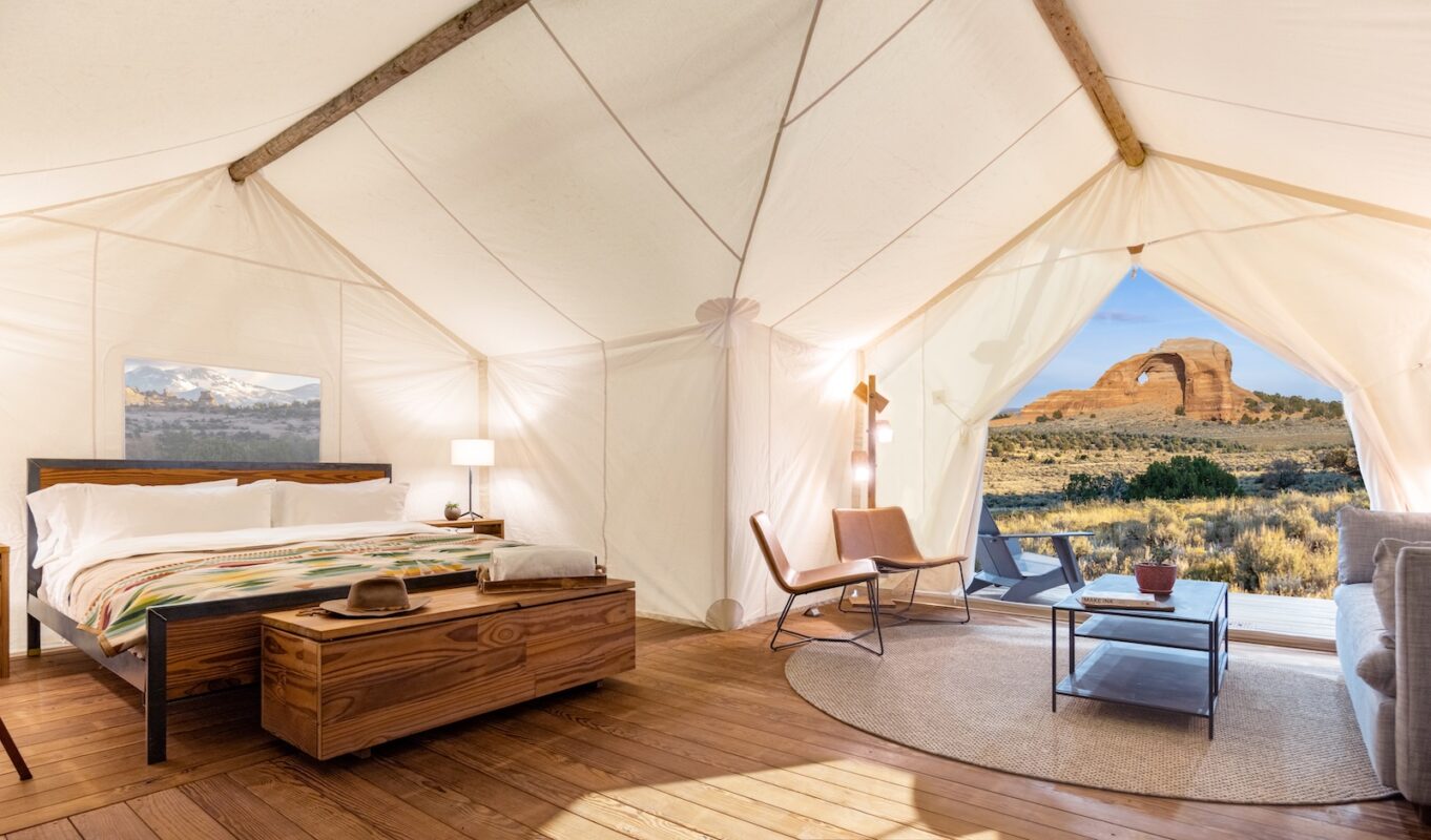 Interior suite tent at ULUM Moab with a view of looking glass arch.