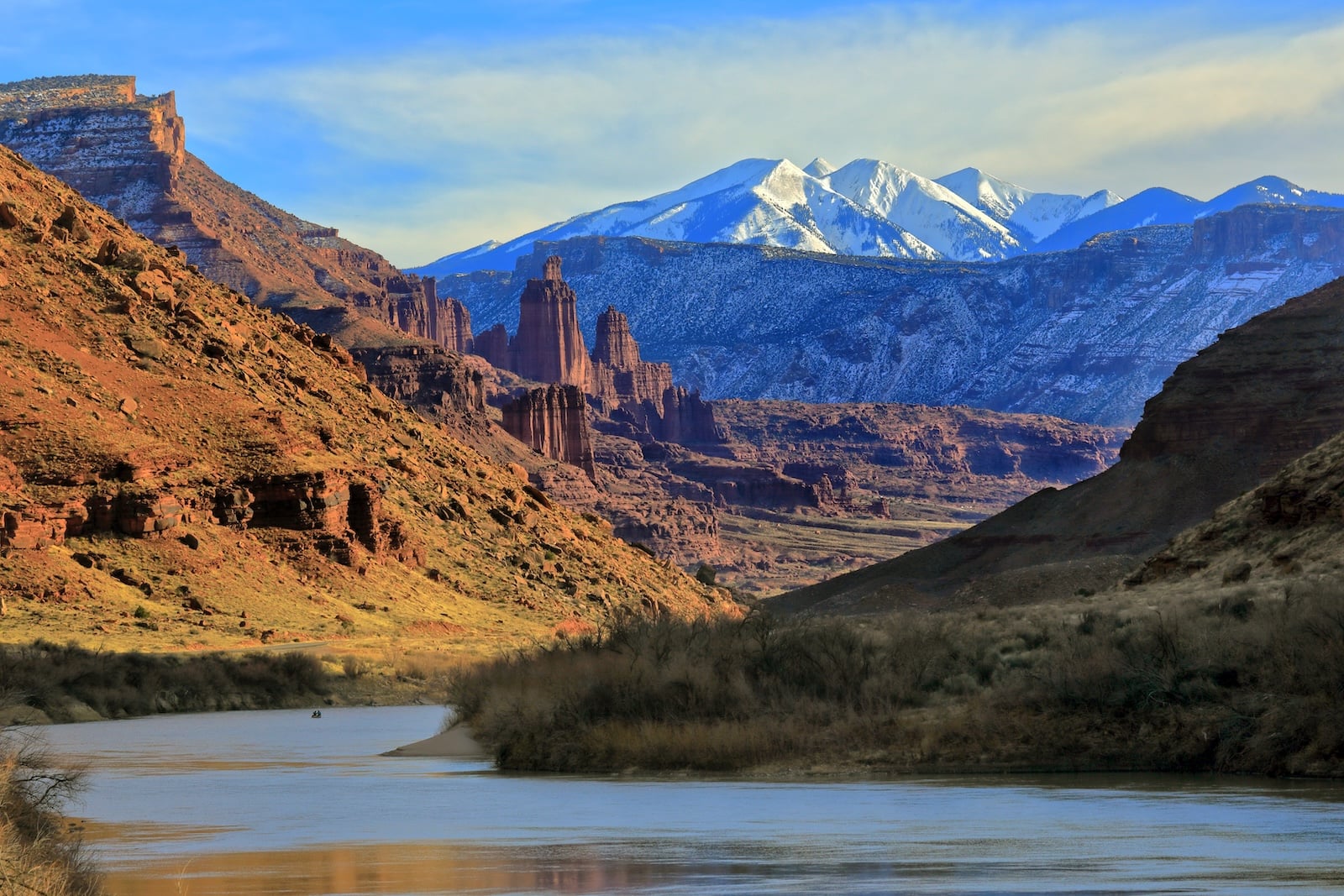 Fisher tower with the La Sal Mountains in the background.