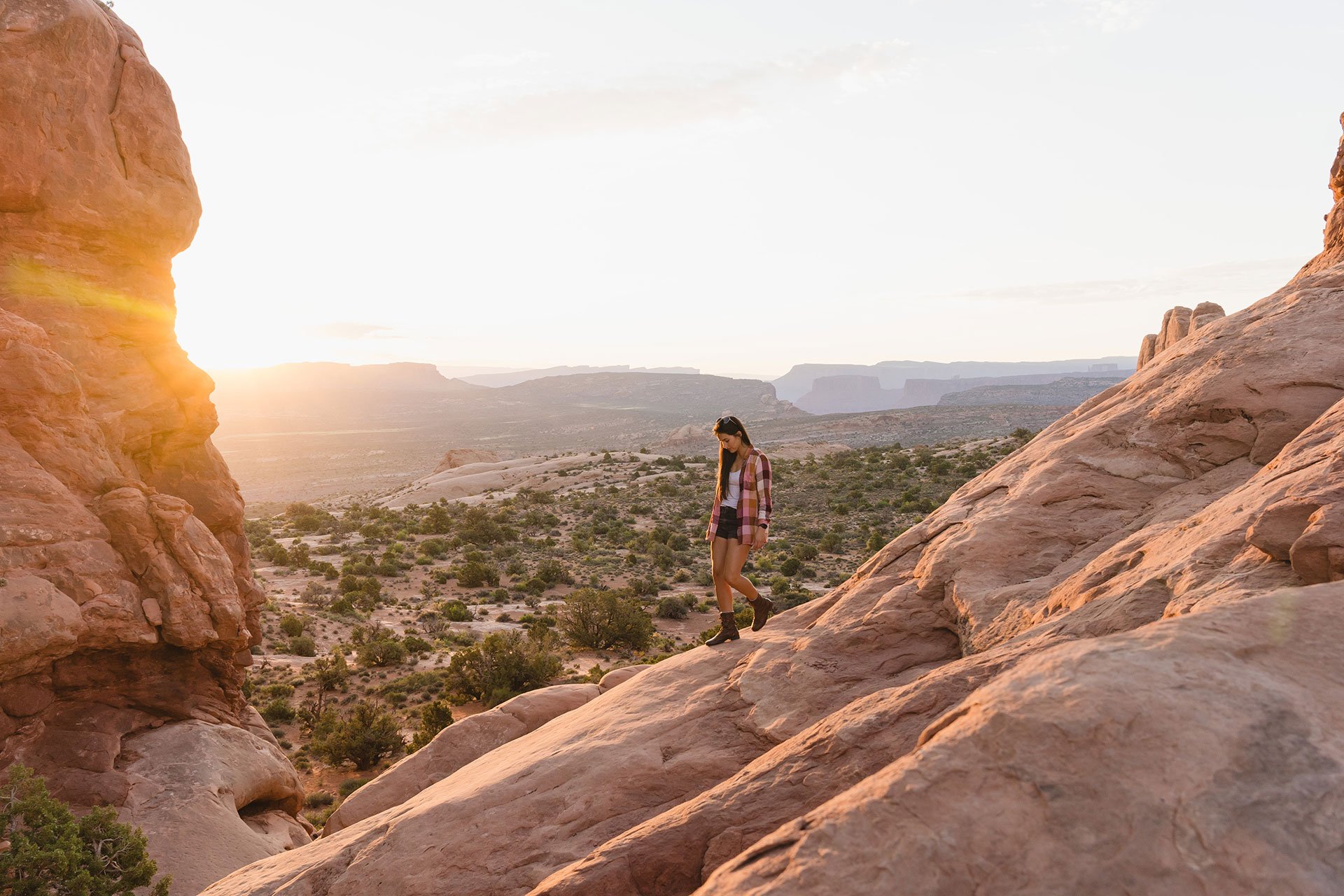 Hiker taking in the views across Canyonlands National Park