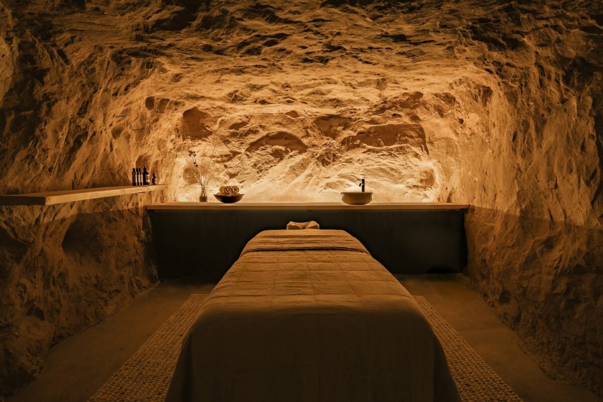Massage area in a natural stone cave at ULUM Moab.